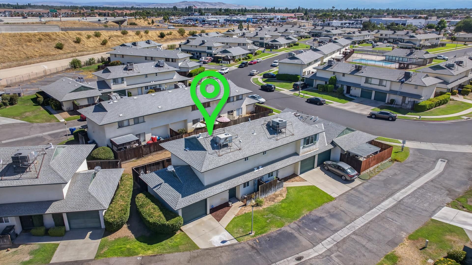 Drone photograph of a Central Valley property showing lot and surroundings